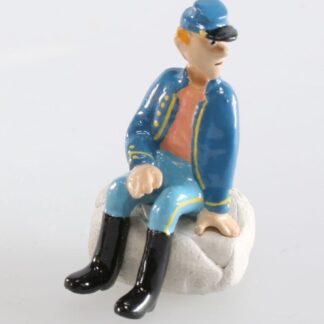 Les Tuniques Bleues : Figurine en métal : Soldat assis main gauche par terre uniforme ouvert