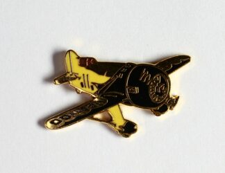 Pin's Démons & Merveilles : Avion brun et jaune