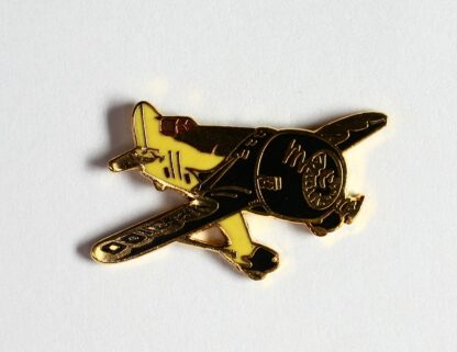 Pin's Démons & Merveilles : Avion brun et jaune