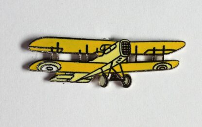 Pin's Démons & Merveilles : Avion Biplan jaune
