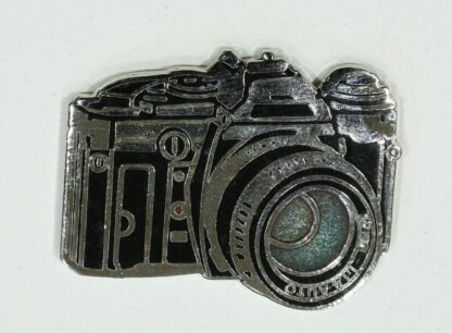 Pin's, Démons & Merveilles, Appareil photo