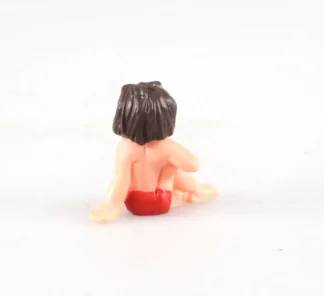 figurine-mowgli-assis-livre-de-la-jungle-disney-dos