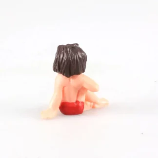 figurine-mowgli-assis-livre-de-la-jungle-disney-dos