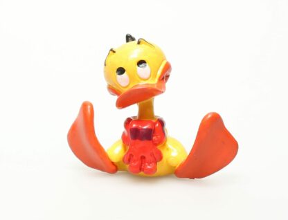 Alfred le canard, Figurine, Alfred assis
