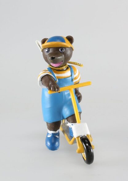Figurine, Petit ours brun à trottinette