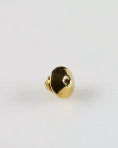 pins-attache-pompe-dore-coté