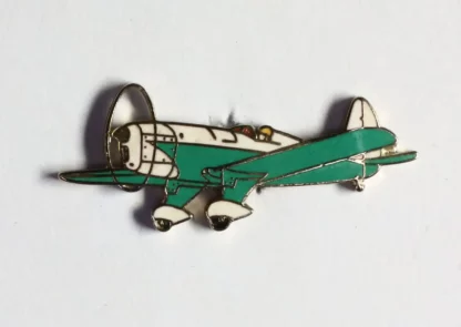 Pin’s avion vintage Démons et Merveilles