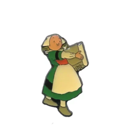 Pin's Bécassine avec son livre