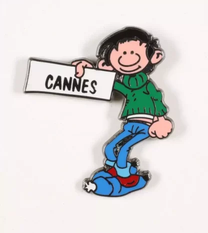 Pin’s Gaston Lagaffe fait du stop pour Cannes édition Corner Franquin