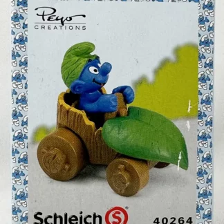 Les Schtroumpfs Figurine en pvc Schtroumpf en voiture feuille + boite-emballage