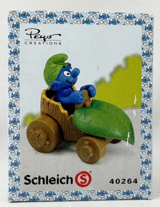 Les Schtroumpfs Figurine en pvc Schtroumpf en voiture feuille + boite-emballage