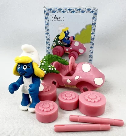 Les Schtroumpfs Figurine en pvc Schtroumpfette en voiture + boite