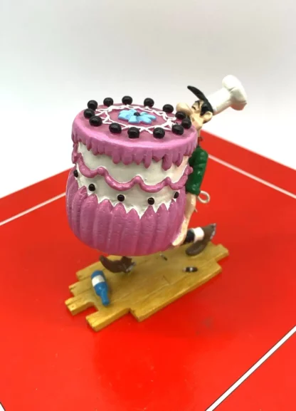 Figurine Pixi Lucky Luke 5477 Avrell portant le gâteau de mariage avec Miss Belle dedans